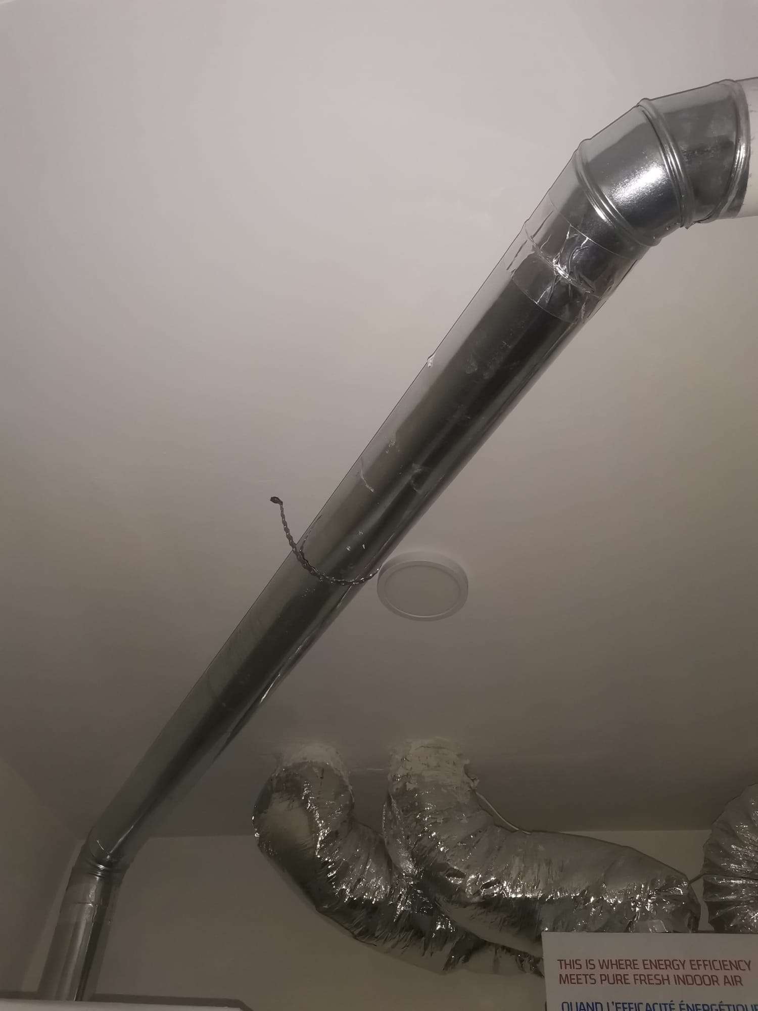 Ceiling neatly closed and finished around the ductwork