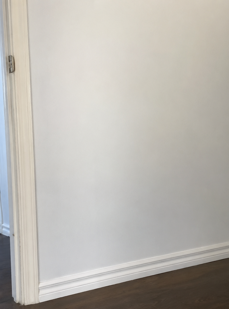 The same interior wall cleanly repaired and freshly painted